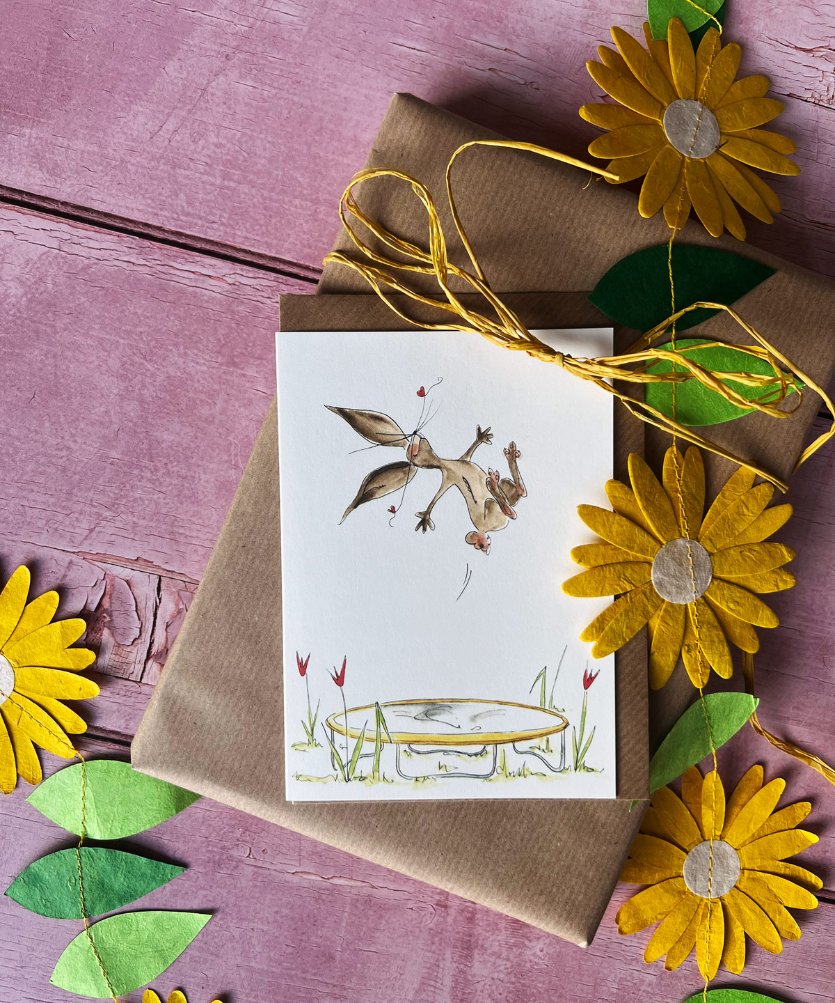 Lustige Osterkarte | Osterhase springt auf Trampolin | Klappkarte mit Umschlag